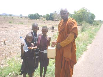 Giving water for Masai people.jpg
